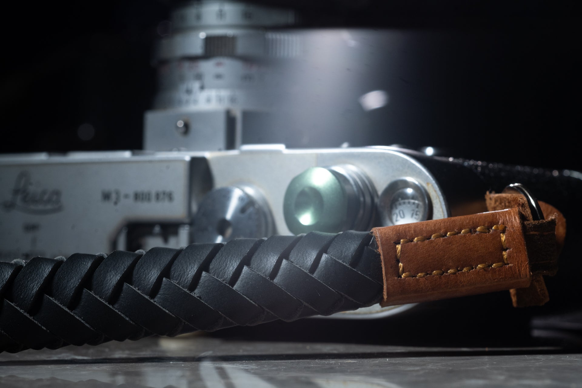 leather camera strap and film camera